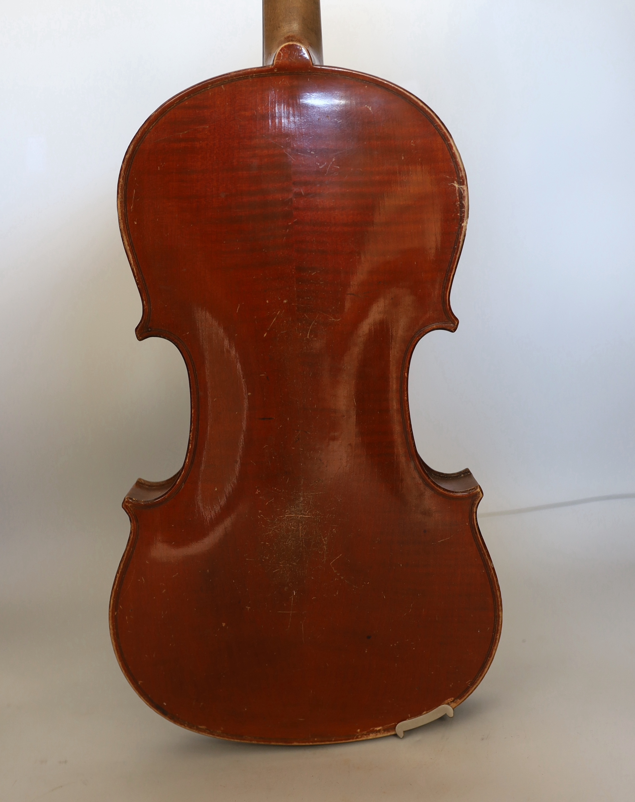 A full sized German violin and case, violin 60cm long